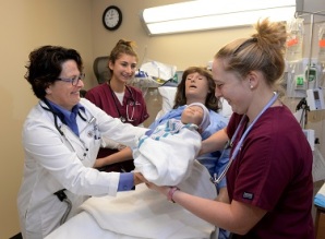 From left are Sacred Heart University nursing faculty member Pennie Sessler-Branden and nursing students Christina Sepe and Meaghan Gallagher. Photo by Tracy Deer-Mirek 9/26/14
